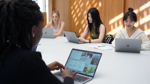 students with laptops
