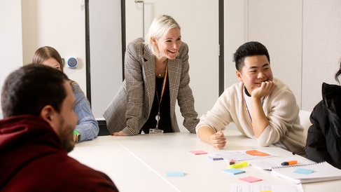 A group of people in meeting room