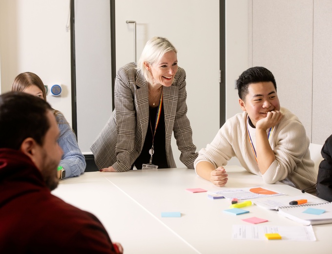 A group of people in meeting room
